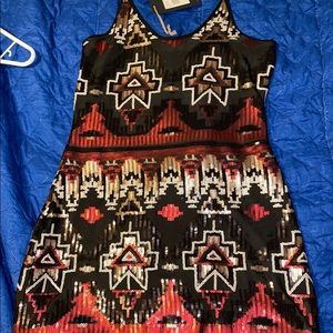 Aztec print sequin dress brand new with tags. This hits at mid thigh